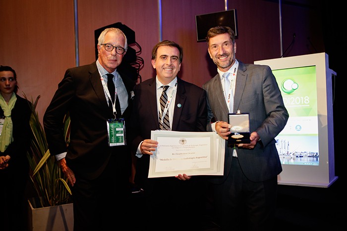Dr. Roberto Villavicencio, Dr. Luis Fajre y Dr. Claudio Bonini