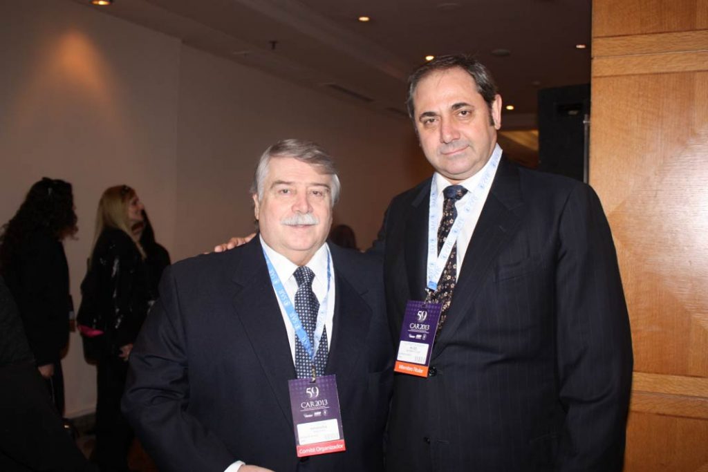 Dr. Juan Carlos Mannara (Presidente de SAEU) y Dr. Alfredo Buzzi (Presidente de SAR)